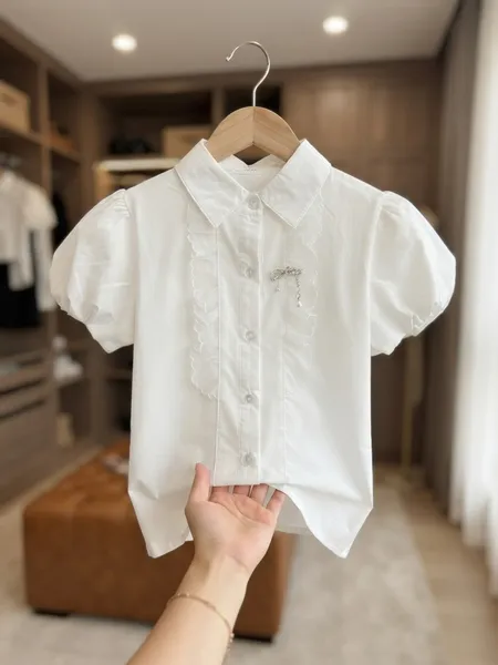 Белая блузка