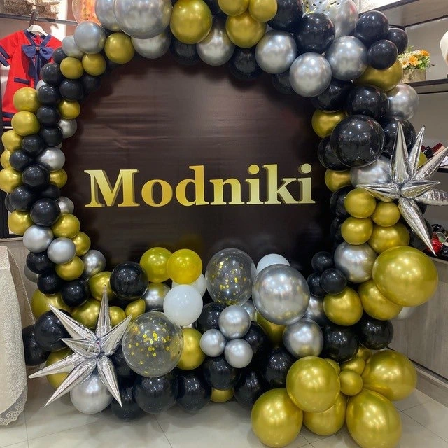 Modniki Kidss logo
